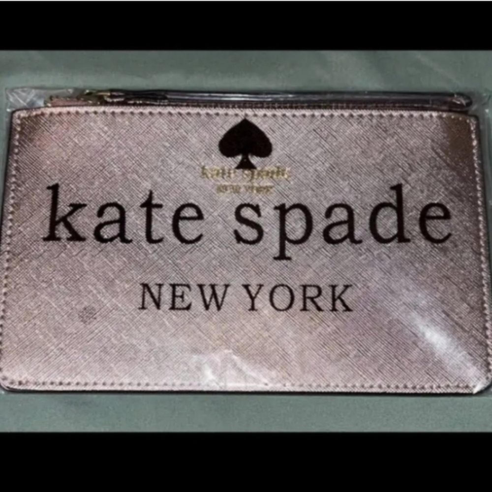 kate spade New Metallic Rose Pink Wrist Clutch . Very Pretty